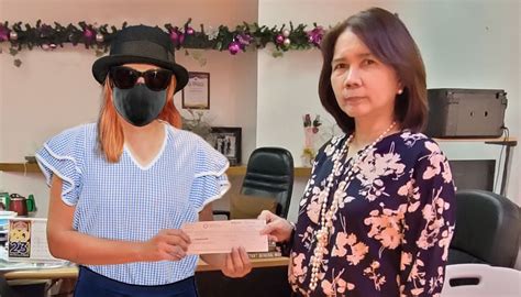 PCSO confirms viral photo of lotto winner edited for security purposes.